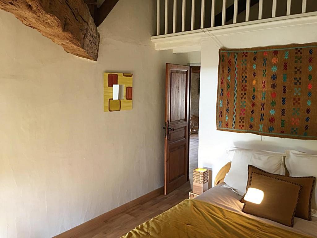 Postel nebo postele na pokoji v ubytování La Chartreuse