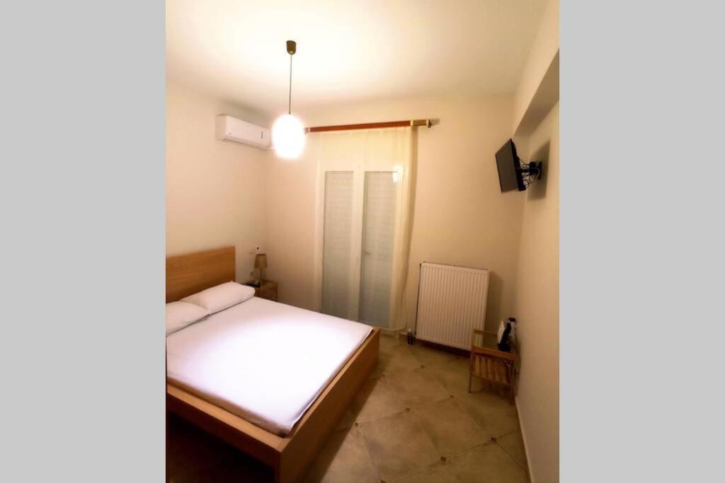 Posteľ alebo postele v izbe v ubytovaní Melina Apartment