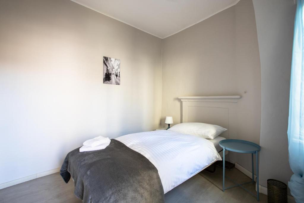 Una cama o camas en una habitación de Osteria Pozzo