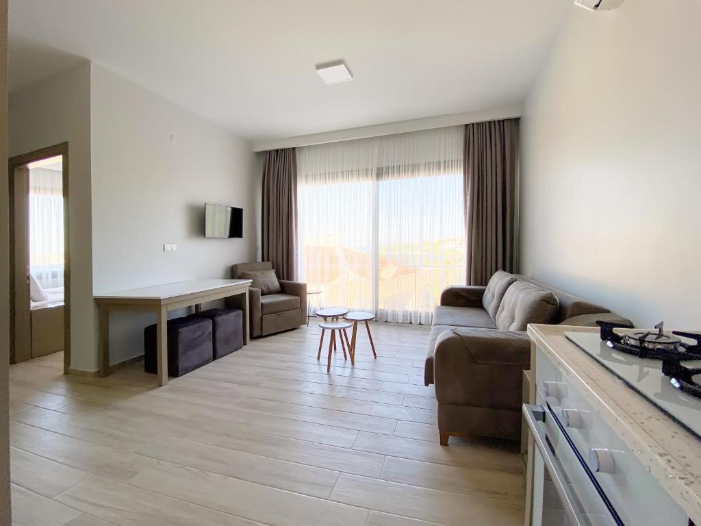 A kitchen or kitchenette at Azize Palas Apart Otel