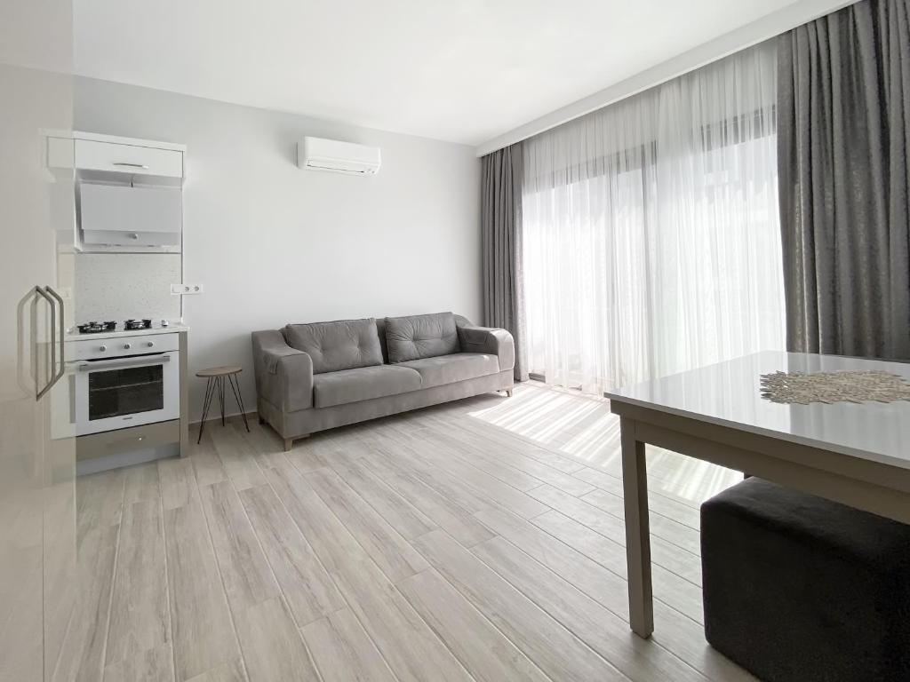 A kitchen or kitchenette at Azize Palas Apart Otel