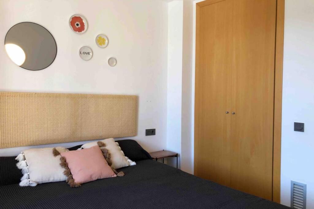 Posteľ alebo postele v izbe v ubytovaní Edifici Ciutadella