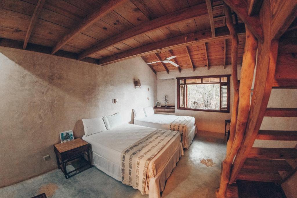 Postel nebo postele na pokoji v ubytování Altos de Caño Hondo