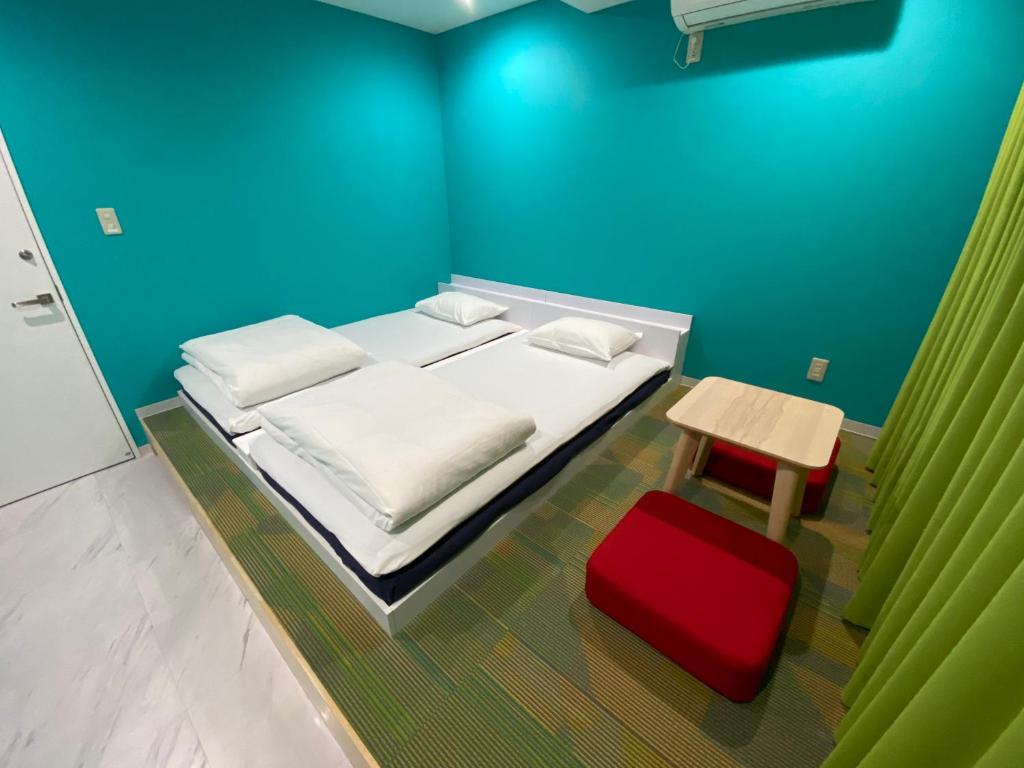 Postel nebo postele na pokoji v ubytování Hostel Anchorage