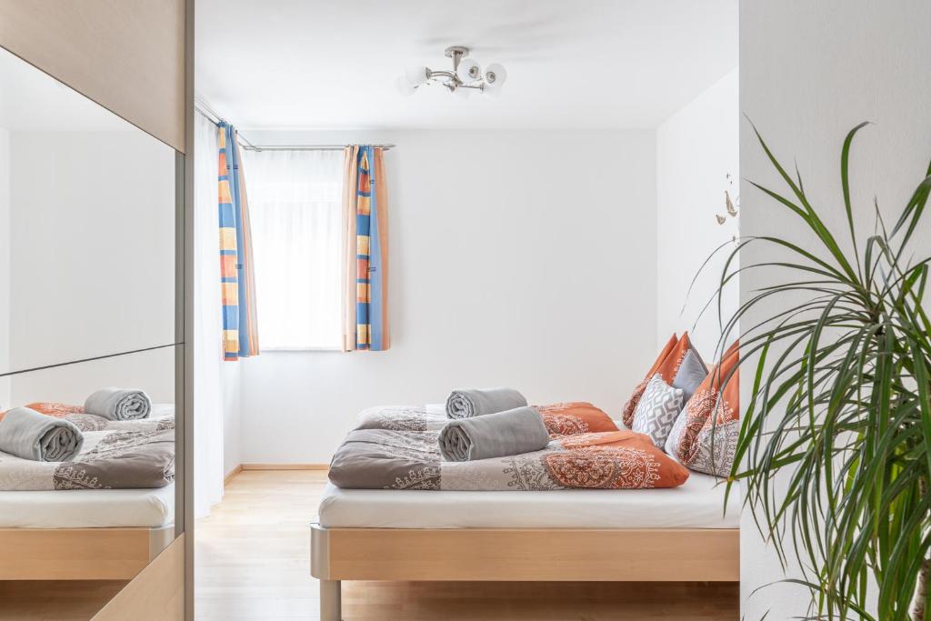 Posteľ alebo postele v izbe v ubytovaní Appartement Taurachblick