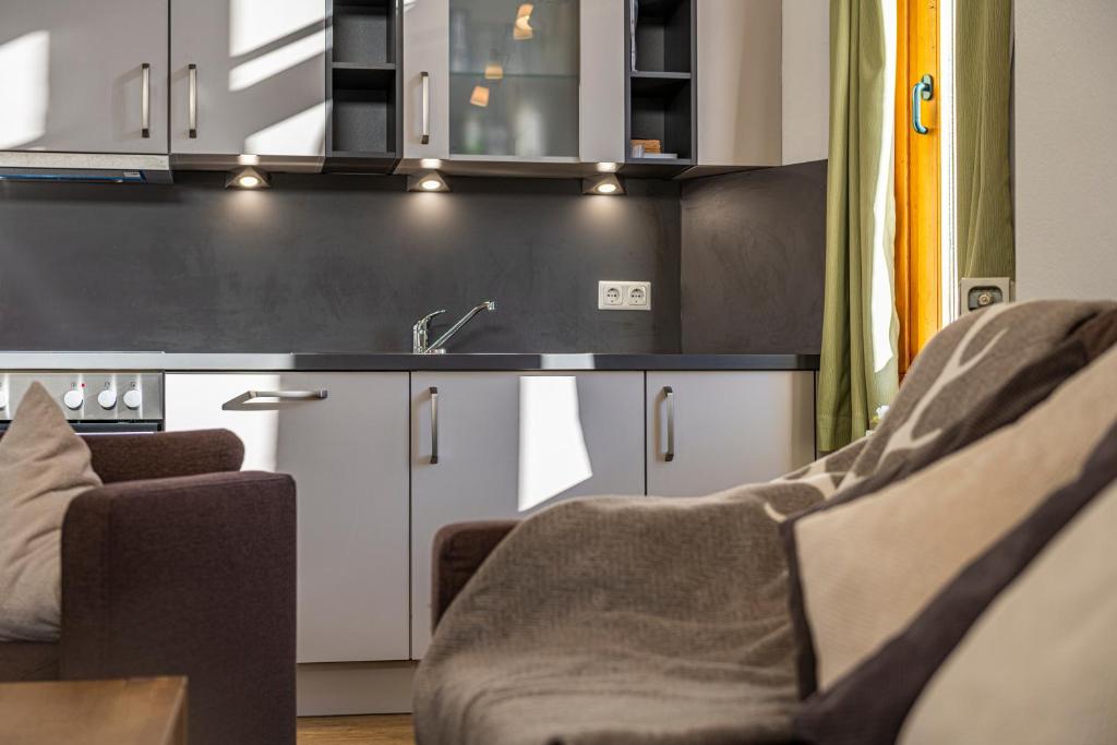 Posezení v ubytování Hotel Das Gastein - ganzjährig inklusive Alpentherme Gastein & Sommersaison inklusive Gasteiner Bergbahnen