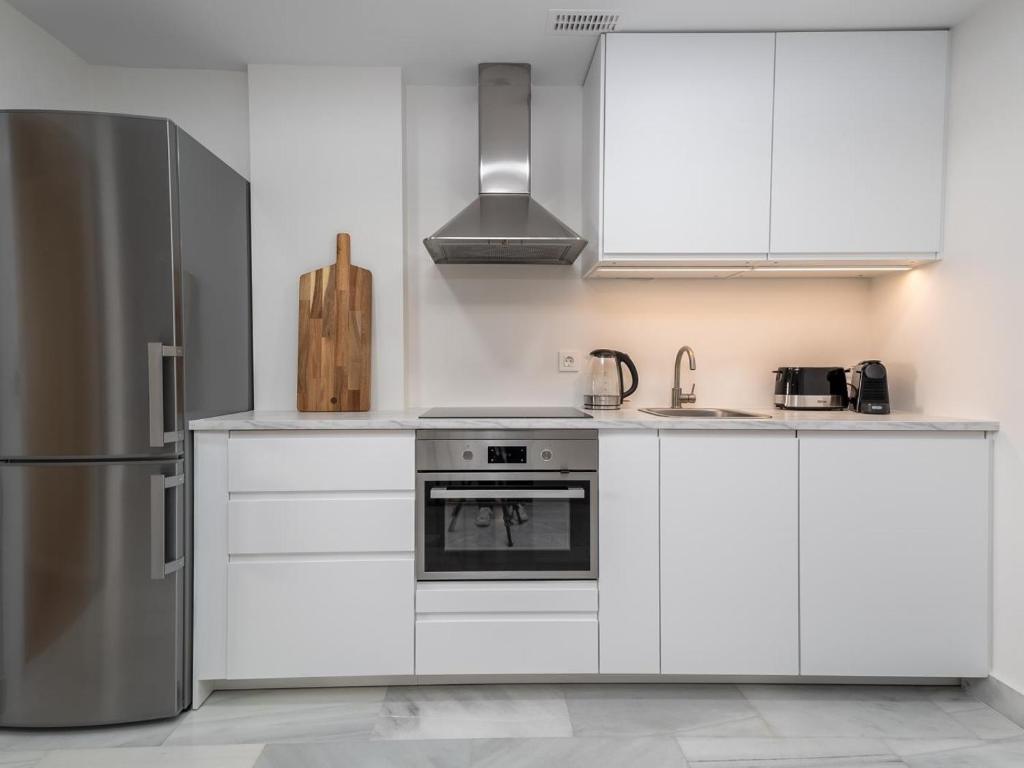 Kuchyňa alebo kuchynka v ubytovaní Señorío de aloha 2 bedroom within walking distance to Puerto Banus