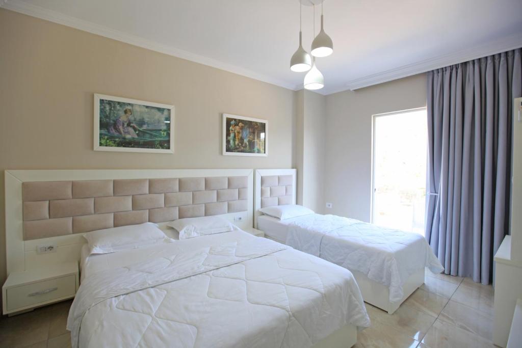 Letto o letti in una camera di Hotel Mare