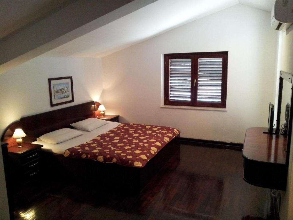 Postel nebo postele na pokoji v ubytování Villa Sara Guesthouse
