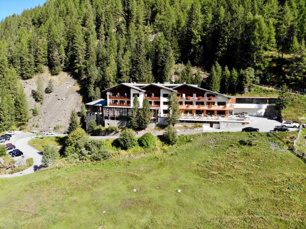an aerial view of a hotel on a mountain at Hotel Marlet in Solda
