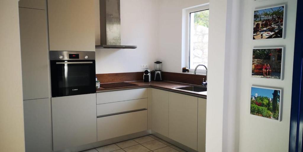 A kitchen or kitchenette at Villa Andrea