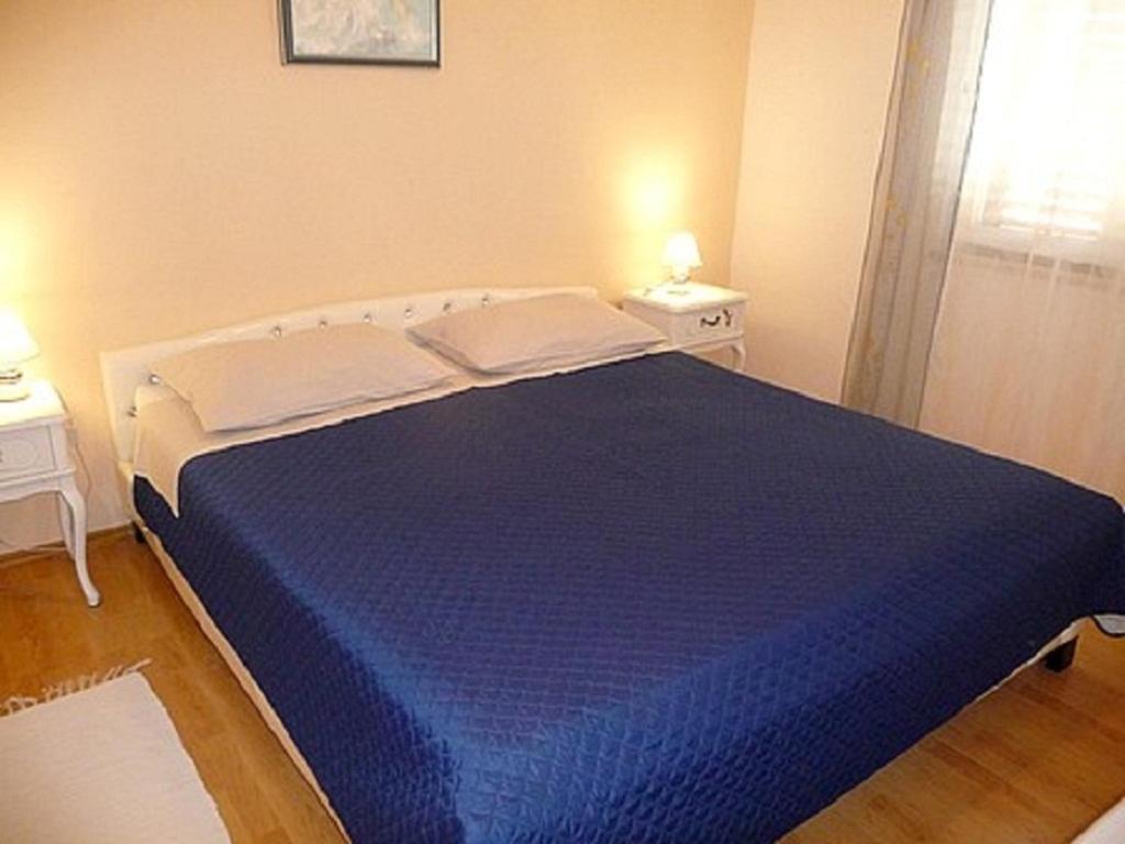 Postel nebo postele na pokoji v ubytování Apartment Davorka (4348)