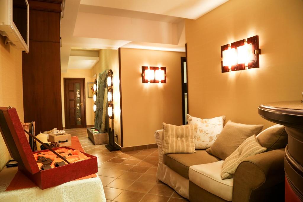 Posezení v ubytování Hotel Foisorul cu Flori