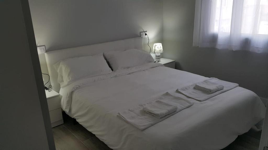 Ένα ή περισσότερα κρεβάτια σε δωμάτιο στο GS ALCÁZAR