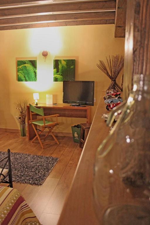 TV a/nebo společenská místnost v ubytování Posada Ormas