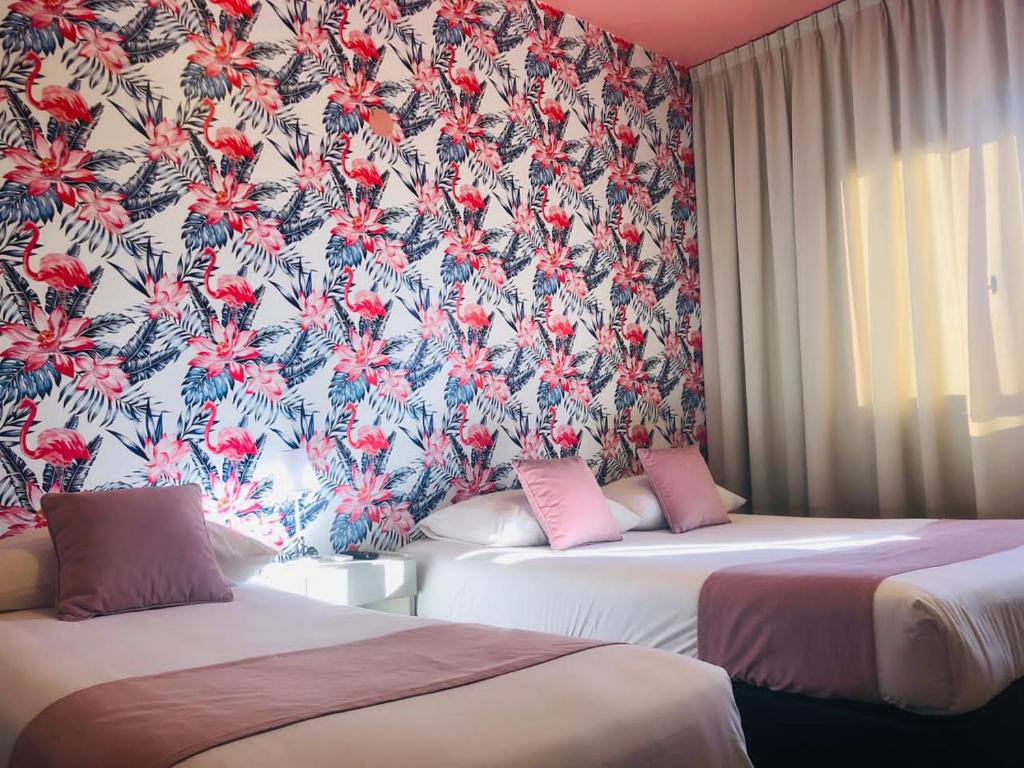 Cama o camas de una habitación en HOTEL CITY