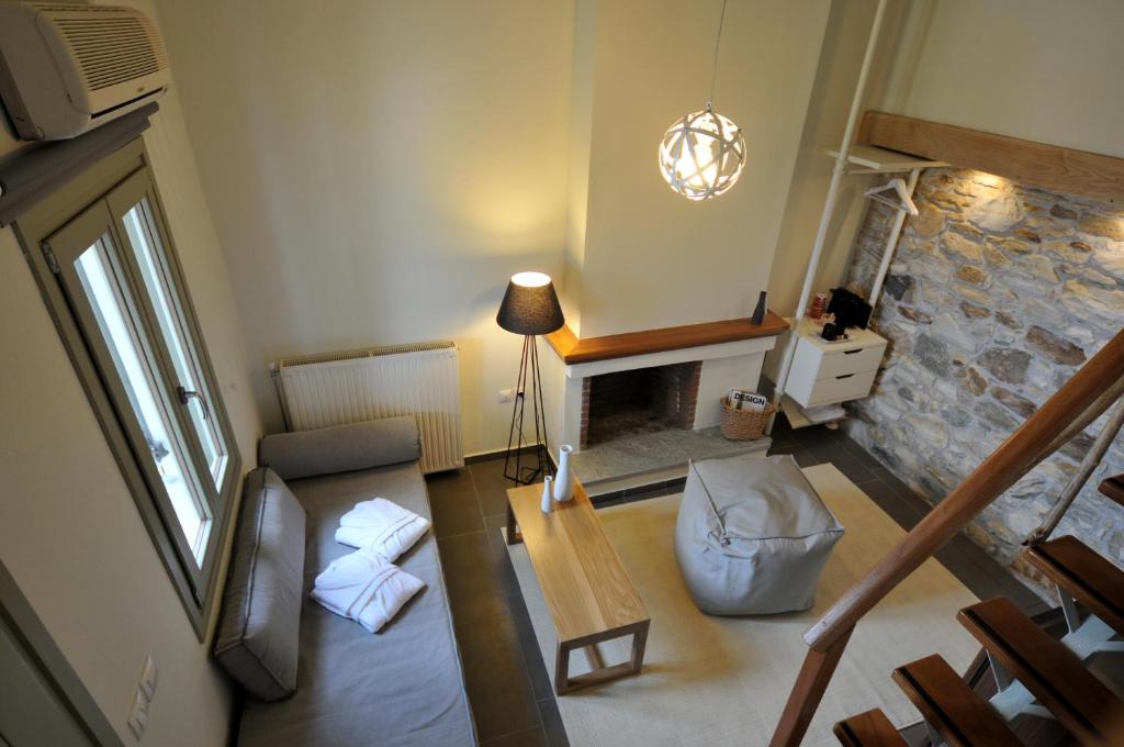 Postel nebo postele na pokoji v ubytování Olga Hotel Mouresi