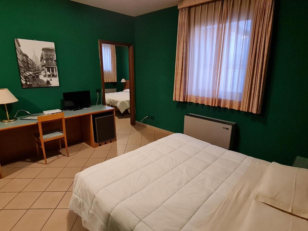 Postel nebo postele na pokoji v ubytování Modo Hotel