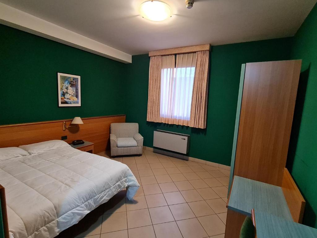 Postel nebo postele na pokoji v ubytování Modo Hotel