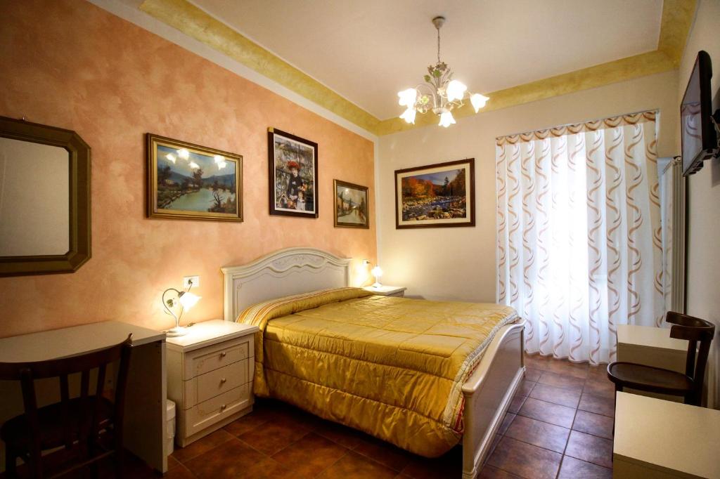 Postel nebo postele na pokoji v ubytování B&B In Centro a Pacentro
