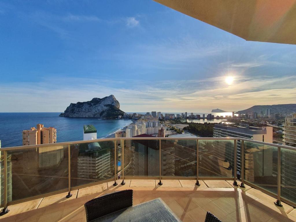 a view of the ocean from the balcony of a building at Apartamentos Esmeralda Suites Unitursa in Calpe