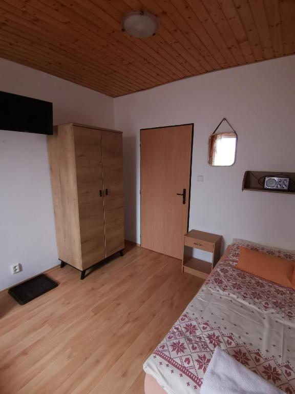Postel nebo postele na pokoji v ubytování A1 Štart