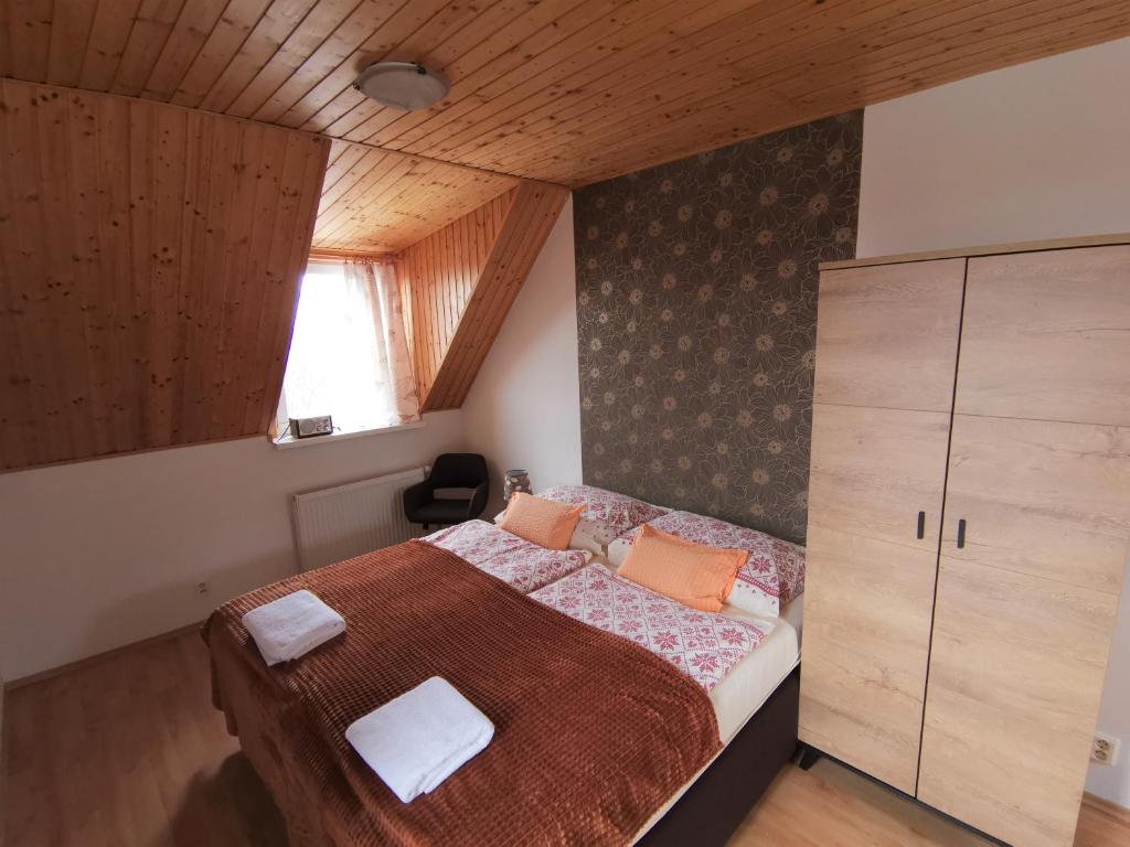 Postel nebo postele na pokoji v ubytování A1 Štart