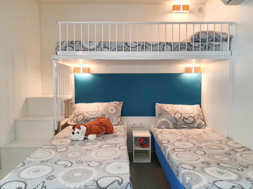 Postel nebo postele na pokoji v ubytování Camping Union Lido