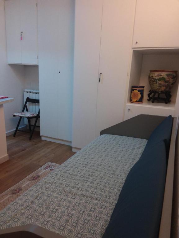 Postel nebo postele na pokoji v ubytování Rina Rooms