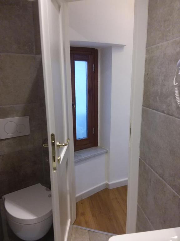 Koupelna v ubytování Rina Rooms