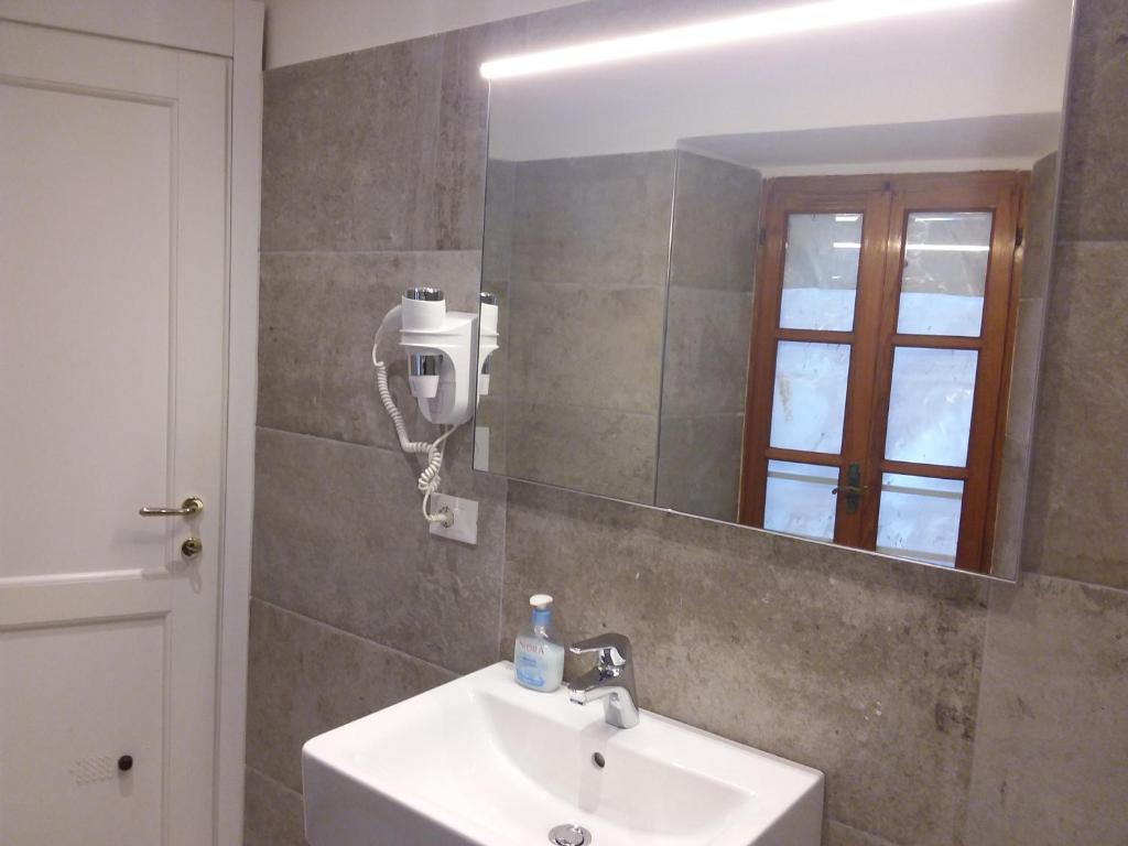 Koupelna v ubytování Rina Rooms