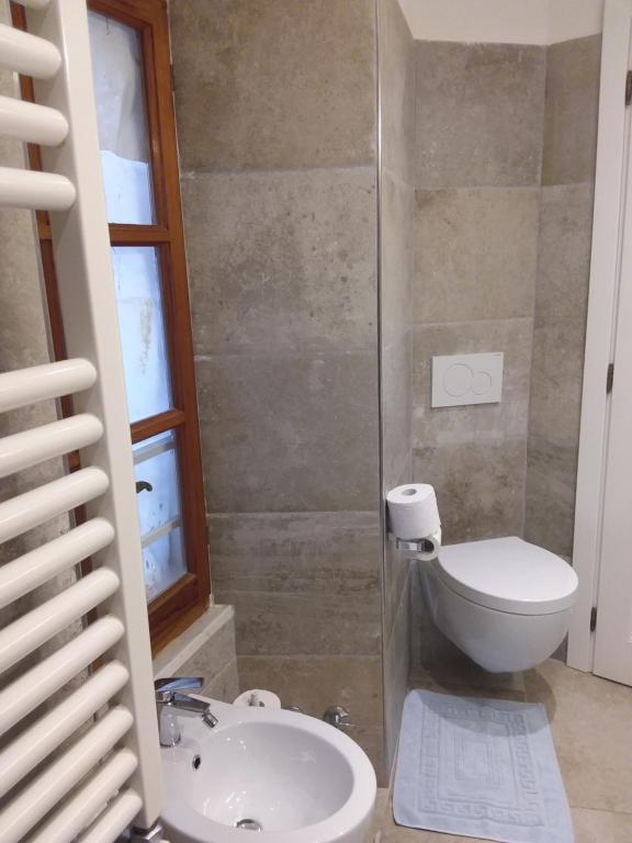 Koupelna v ubytování Rina Rooms