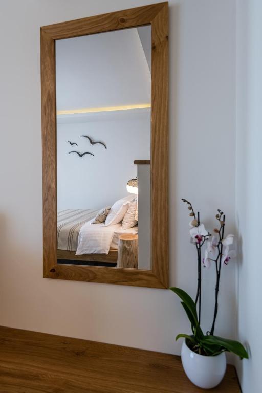Postel nebo postele na pokoji v ubytování NISSEA Boutique Hotel