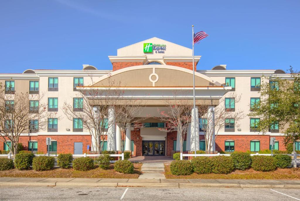 
a large building with a large clock on the front of it at Holiday Inn Express Hotel & Suites Gulf Shores, an IHG Hotel in Gulf Shores
