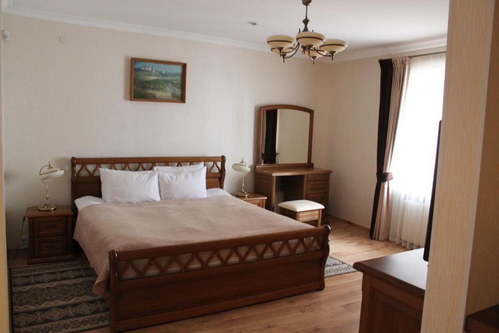 Postel nebo postele na pokoji v ubytování Spadok