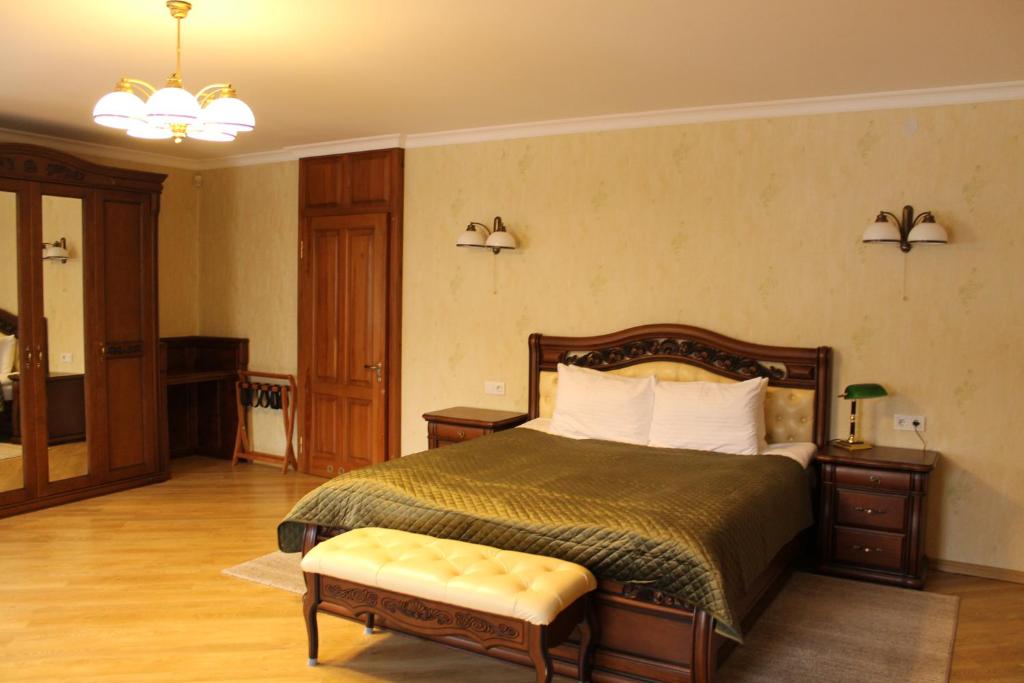 Postel nebo postele na pokoji v ubytování Spadok