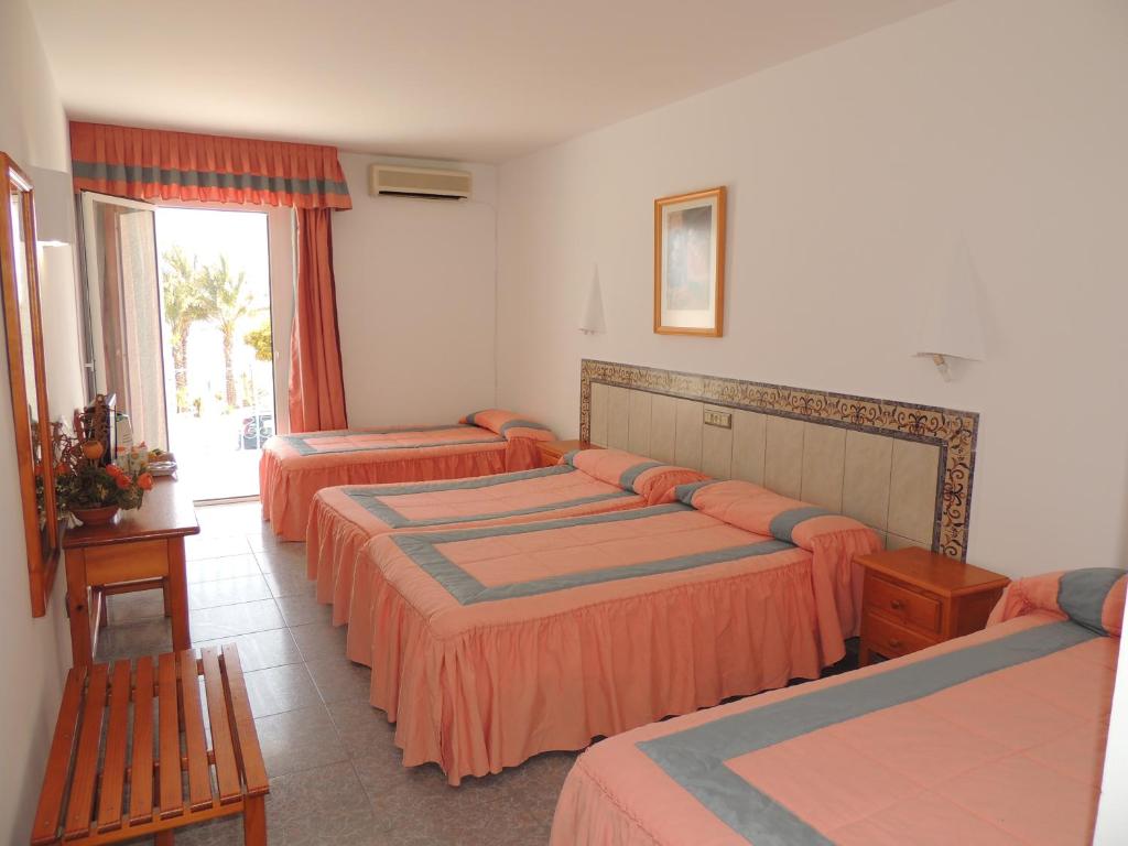 Postel nebo postele na pokoji v ubytování Virgen del Mar Holidays