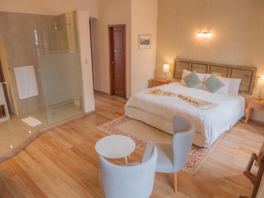 Postel nebo postele na pokoji v ubytování Casa El Edén