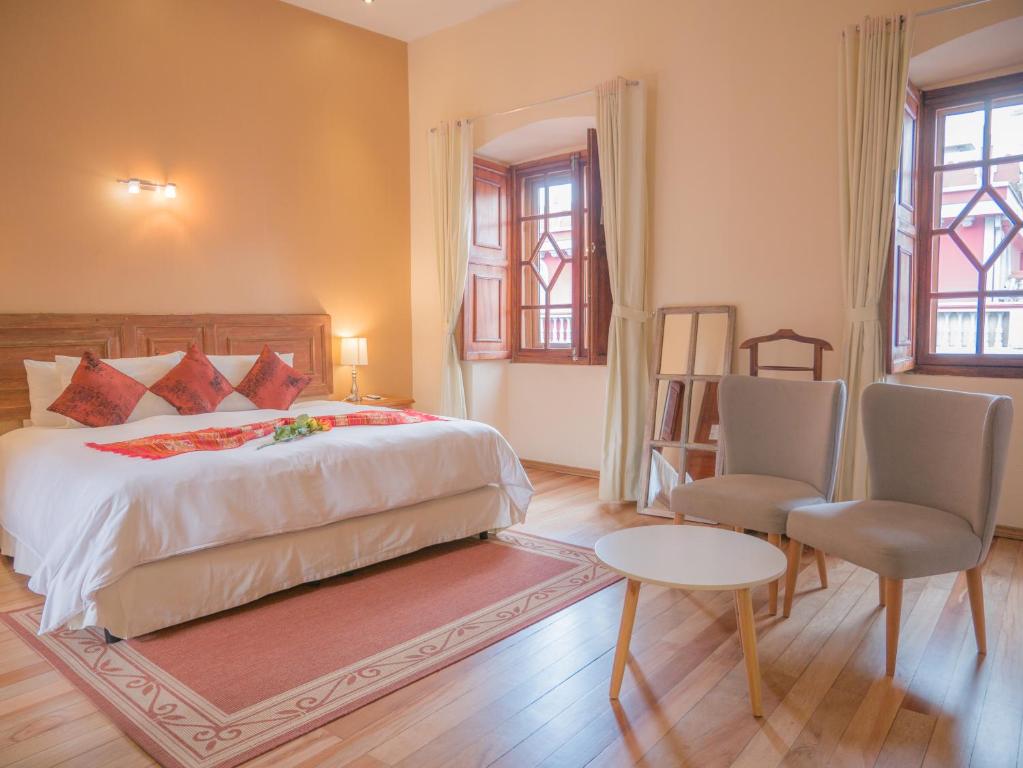Postel nebo postele na pokoji v ubytování Casa El Edén