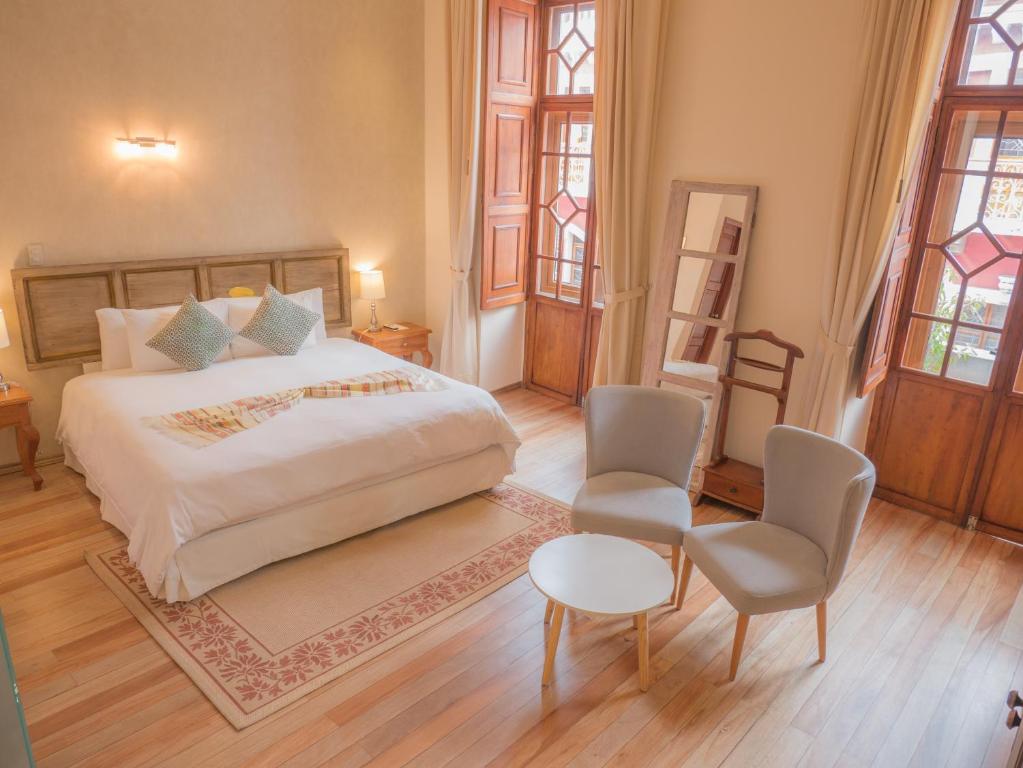 Postel nebo postele na pokoji v ubytování Casa El Edén