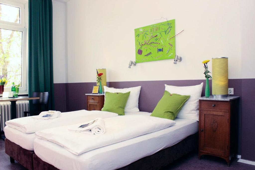 Postel nebo postele na pokoji v ubytování Grand Hostel Berlin Classic