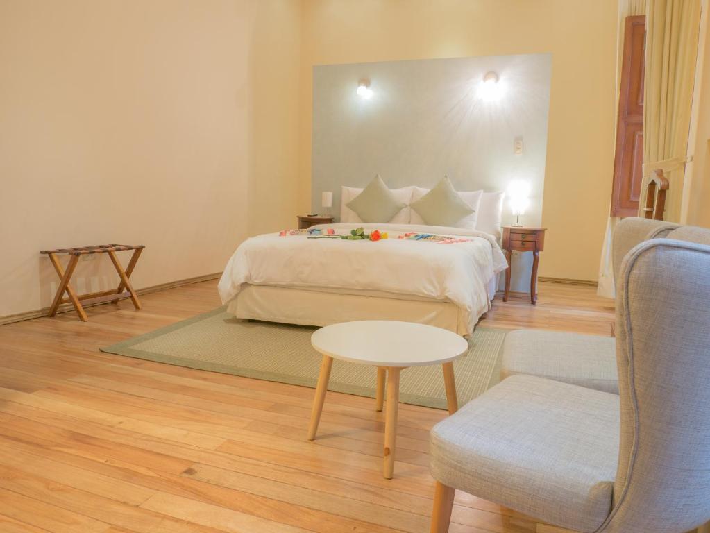 Postel nebo postele na pokoji v ubytování Casa El Edén