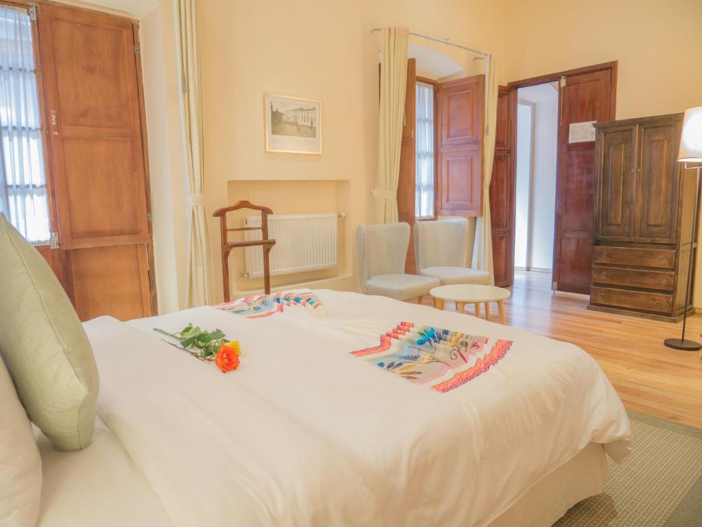 A bed or beds in a room at Casa El Edén