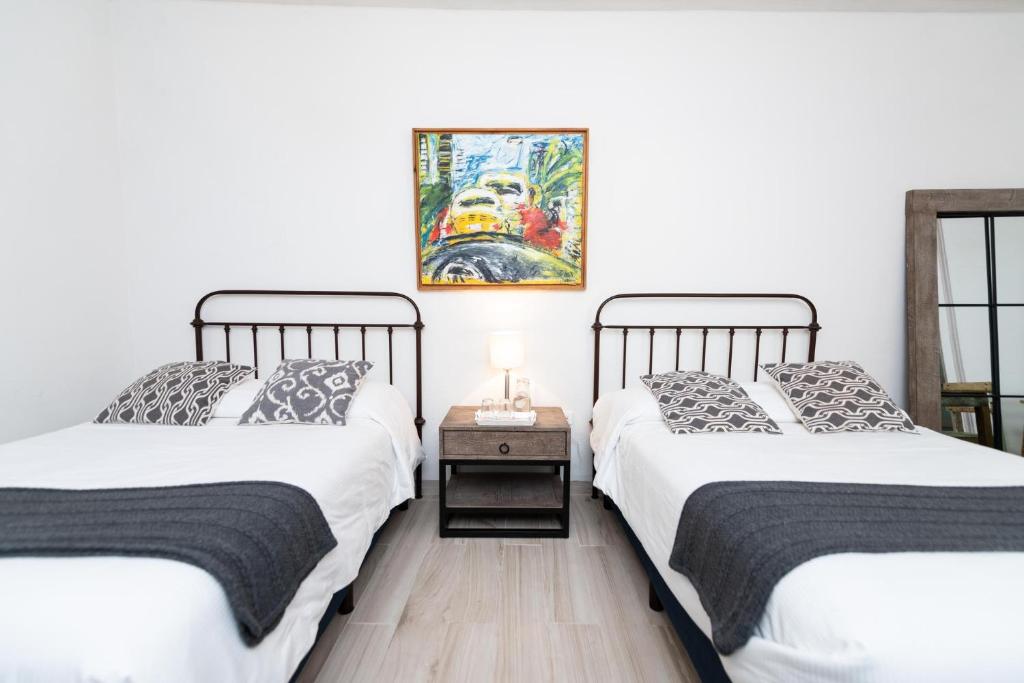 Postel nebo postele na pokoji v ubytování Casa De La O