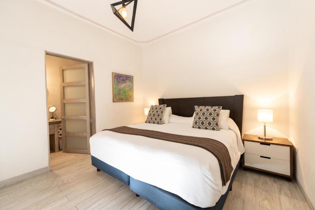 Postel nebo postele na pokoji v ubytování Casa De La O