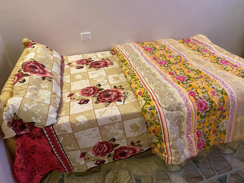 Postel nebo postele na pokoji v ubytování Toman Pyramids hotel