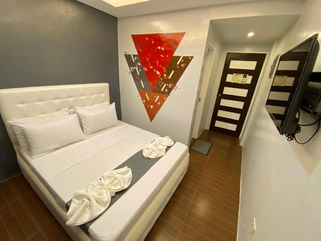 Postel nebo postele na pokoji v ubytování Viajeros Hostel Boracay