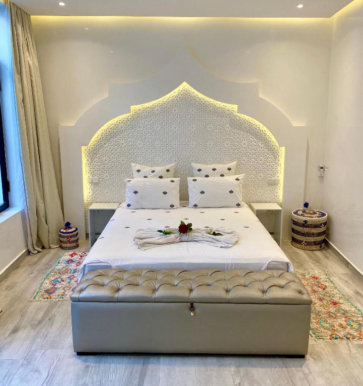 Postel nebo postele na pokoji v ubytování RIAD NOLITA & SPA Kasbah