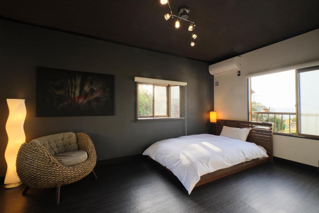 Llit o llits en una habitació de Awaji Aquamarine Resort #1 - Self Check-In Only