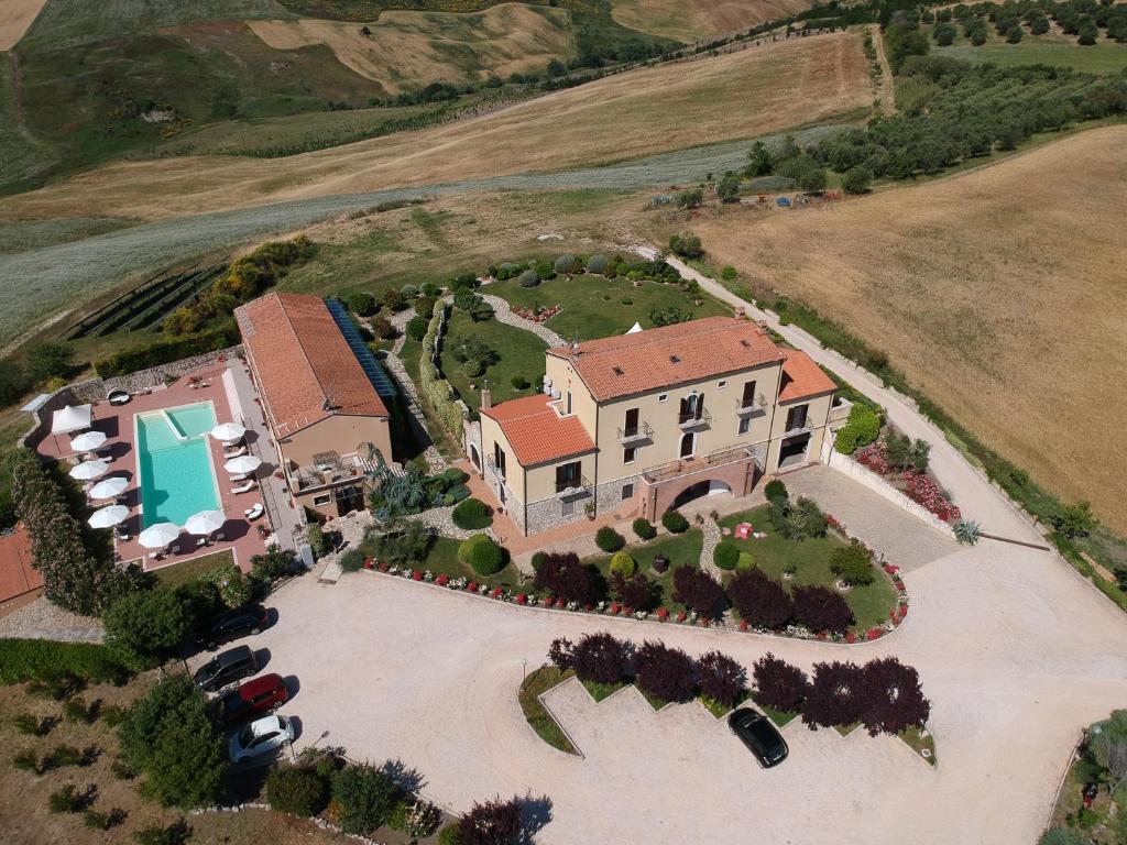 an aerial view of a house with a yard at Masseria Grande in Montecilfone